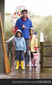 Father with children on beach