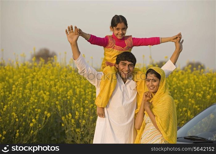 Father with daughter on his shoulders al