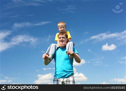 father with little son in summer day outdoors