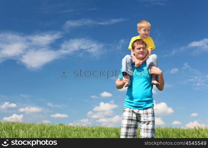 father with little son in summer day outdoors