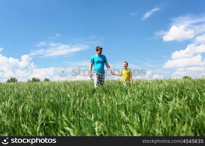 father with little son in summer day outdoors