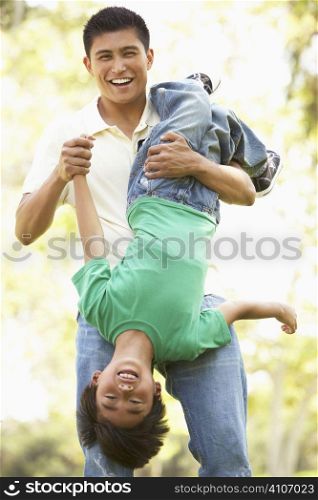 Father With Son In Park