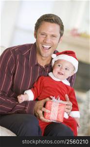 Father With Son In Santa Outfit