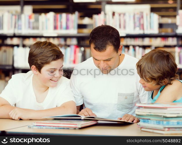 Father with sons in library with books. Father with sons in library