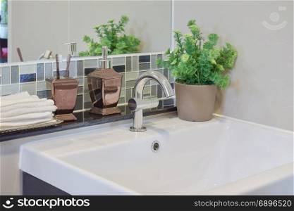 Faucet and lavatory with toothpastes liquid soap bottle