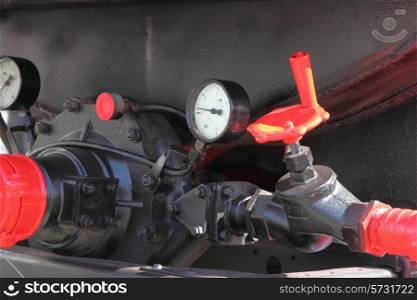 faucet and pressure gauge hydraulics fire truck