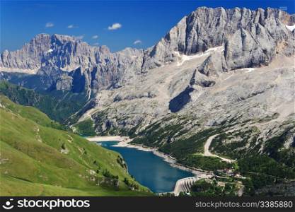 Fedaia pass with the characteristic lake on summer, Italian Dolomites
