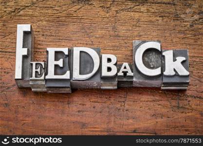 feedback word in vintage metal type printing blocks over grunge wood, mixed fonts in style and size