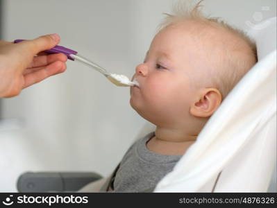 Feeding baby with a spoon