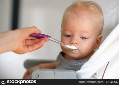 Feeding baby with a spoon