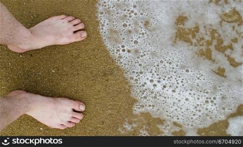 Feet at shore