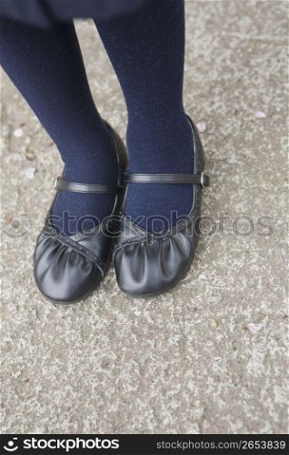 feet wearing tights and shoes