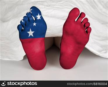 Feet with flag, sleeping or death concept, flag of Samoa