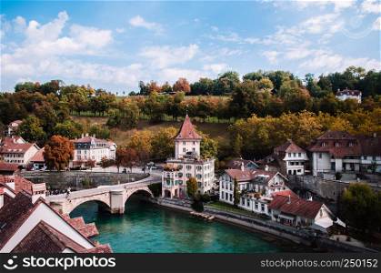 Felsenburg castle tower and Untertorbrucke (Utertor) bridge over turquoise Aare river, Old town Bern - Switzerland