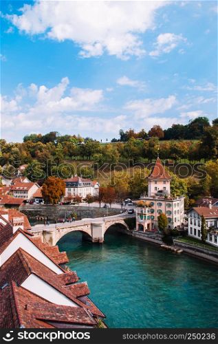 Felsenburg castle tower and Untertorbrucke (Utertor) bridge over turquoise Aare river, Old town Bern - Switzerland