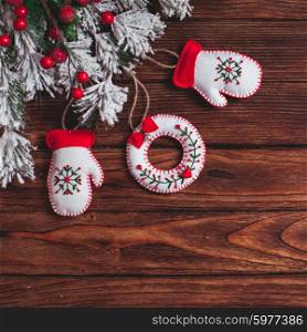 felt Christmas decorations on the wooden table with copy space. felt Christmas decorations