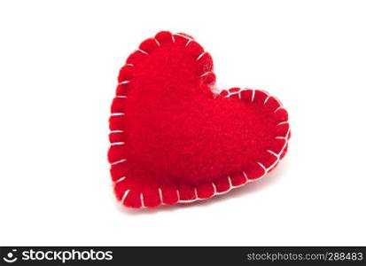 Felt red heart isolated on a white background
