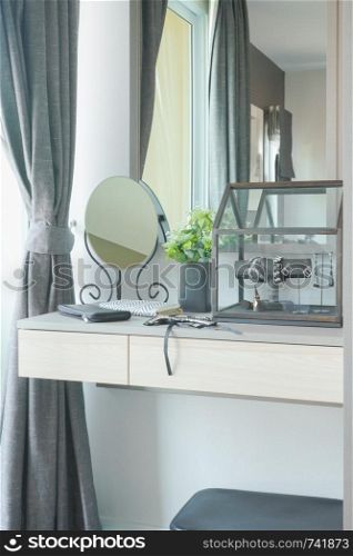 Female accessories on dressing table
