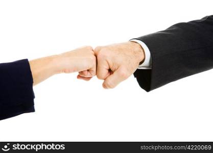 Female and male business people giving a fist bump. Isolated on white.