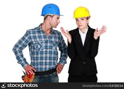 female architect being assertive with craftsman