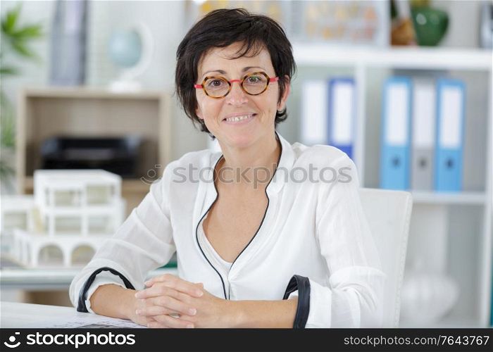 female architect manager looking at camera