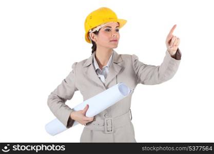 Female architect pointing