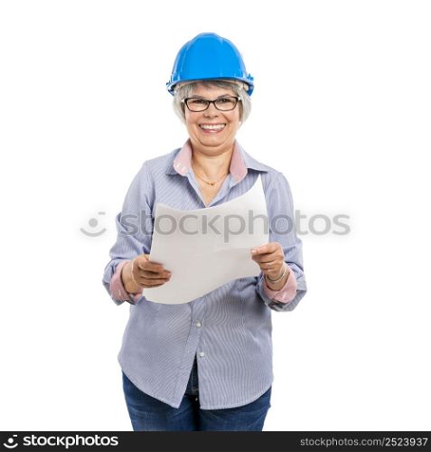 Female architect with a helmet and holding paper projects