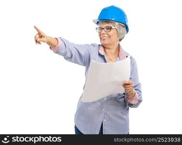 Female architect with a helmet and holding paper projects and pointing