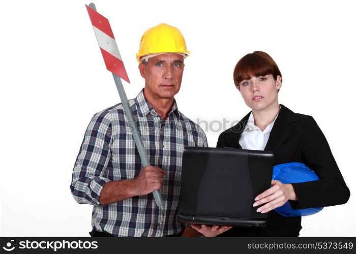 Female architect with worker