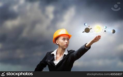 Female architect woman. Attractive woman engineer reaching hand in gesture