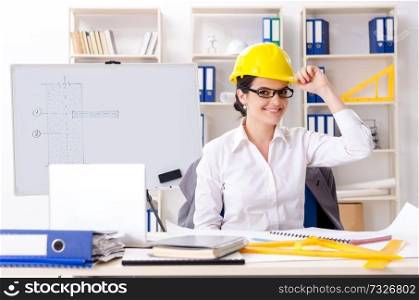 Female architect working in the office 