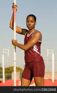 Female athlete preparing for pole jump