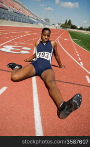 Female athlete stretching