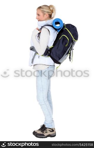 female backpacker in profile