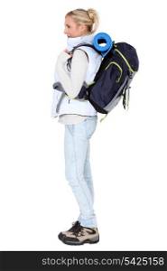 female backpacker in profile