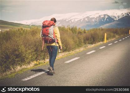 Female backpacker tourist in Icleand ready for adventure