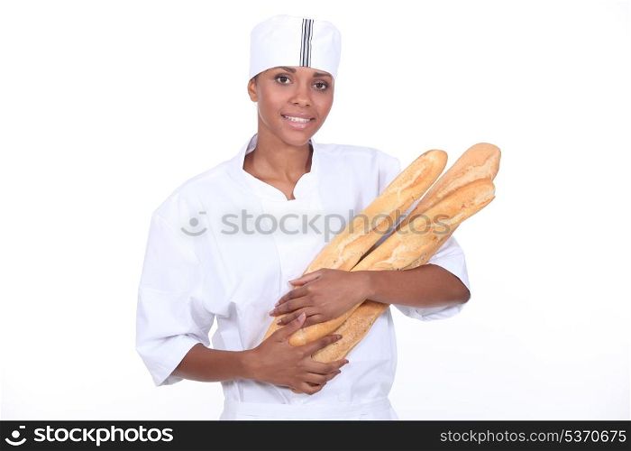 Female baker with baguette
