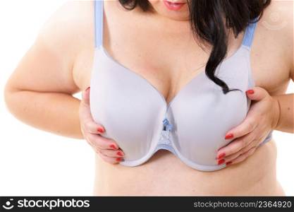 Female big breast in lingerie. Plus size fat mature unrecognizable woman wearing bra. Bosom, brafitting and underwear concept.. Plus size woman big breast wearing bra