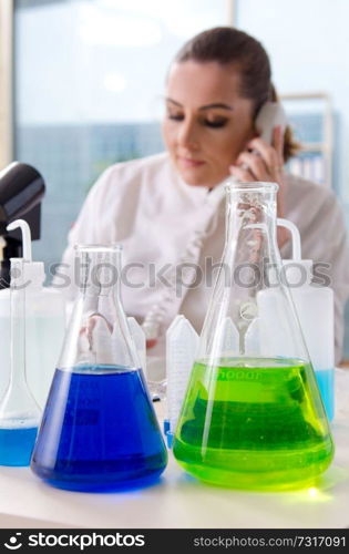 Female biotechnology scientist chemist working in the lab 