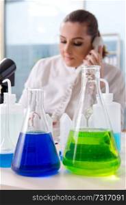 Female biotechnology scientist chemist working in the lab 