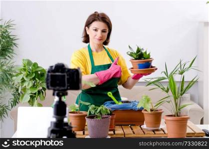 Female blogger explaining houseplants growing 