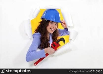 Female builder coming through picture