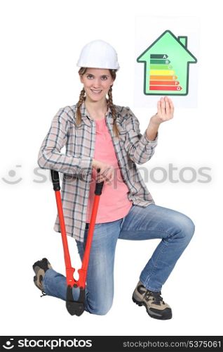 Female builder displaying energy sign