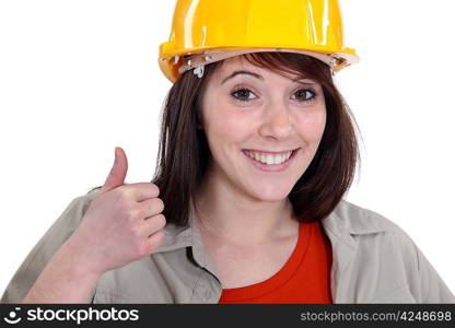 Female builder giving thumbs-up