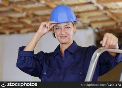 female builder looking at camera