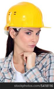 Female builder posing