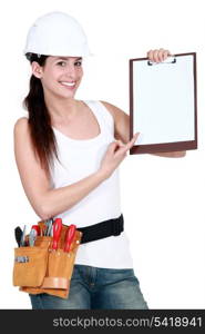 Female builder with a clipboard