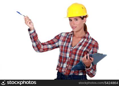 Female builder with a clipboard