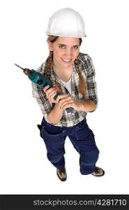 Female builder with a drill