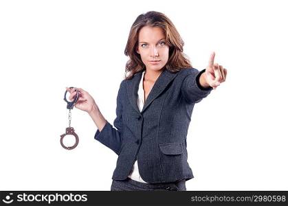Female businesswoman with handcuffs on white